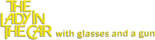 Дама в очках и с ружьем в автомобиле