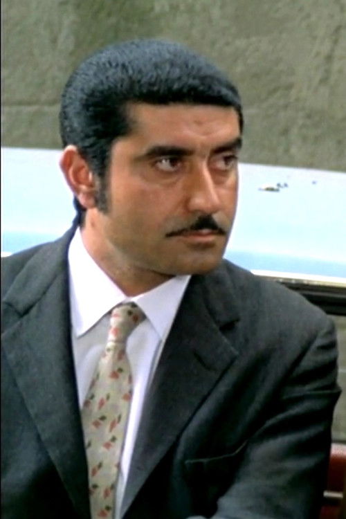 Tressoldi's Henchman in Garage