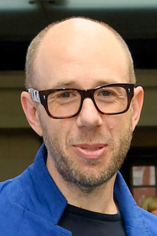 Том Роуландс